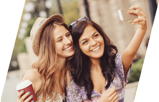 two women taking a picture together